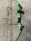 Genesis 10480 Compound Bow - Green With Sight Used. Price: $200.00.