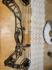 Hoyt Defiant 34 Compound Bow 60-70LBS Rh Camo 27-30IN Qad Hdx Arrow Rest Used. Price: $494.00.
