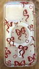 Brand New Packaging Apple Iphone 14PRO Case - Red Bows Hearts. Price: $7.99.
