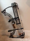 Mathews Z7 Extreme Compound Bow Length 29" With Arrows, Tips, + Trigger Release Used. Price: $950.00.